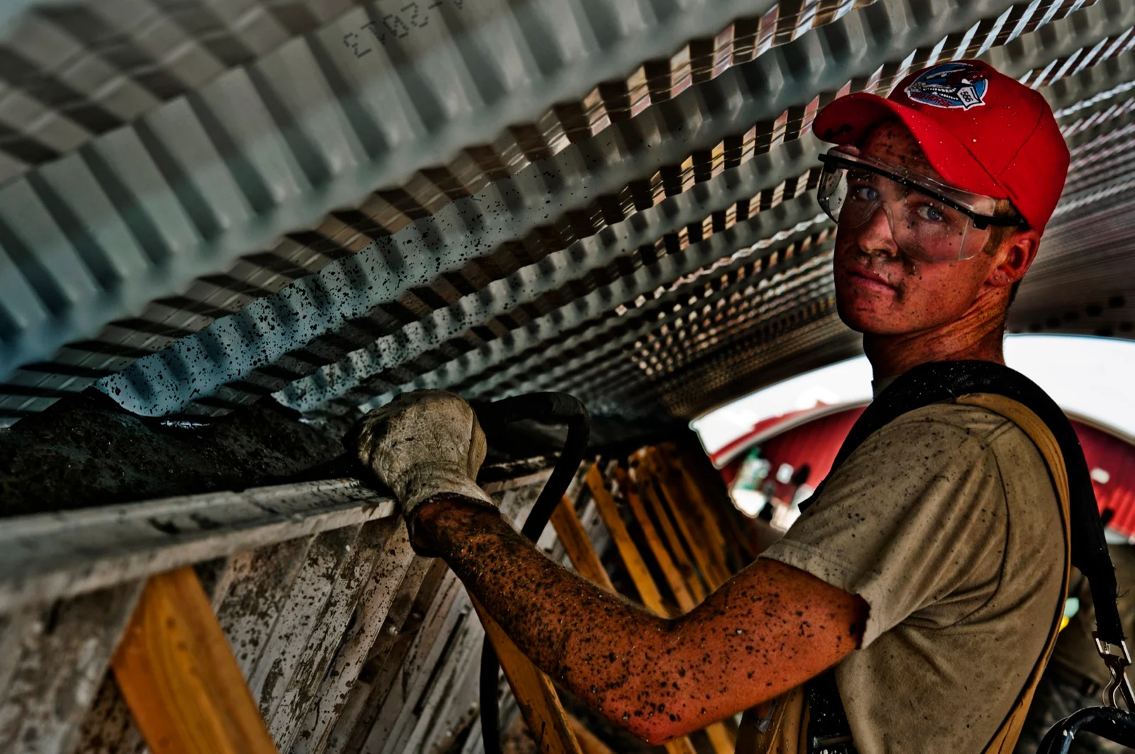 Brightfloor craftsman finishing concrete at sunset